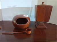 Wooden bowl with scoop and a covered candy jar