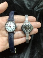 2 Timex watches, stainless steel/ leather is not