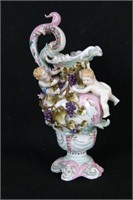 English porcelain figural ewer with cherubs