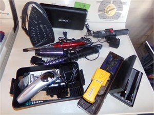 curling irons, clippers, iron, flash light