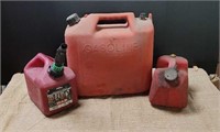 3 Gas cans - 5 gallon and 2 one gallon
