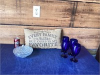Four cobalt blue wine glasses, a candy dish,