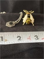 1 1/2 “ bee pin and 9” necklace