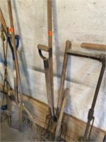 Three pitchforks and a rake, broken handle
