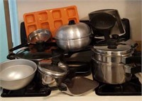 Pots and pans, small skillets, some baking items