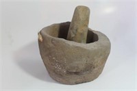 STONE MORTAR AND PESTLE BOTTOM IS BROKEN ON