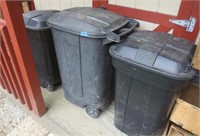 3 lidded trash cans
