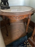 Oval ornate inlay table