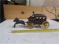 Cast iron horses and stage coach