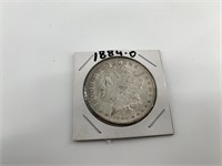 1884 O Morgan silver dollar