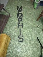 Polished brass letters of Memphis