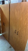 2 cabinets approximately  29” wide x  59” tall