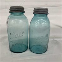 Pair of half gallon blue ball jars