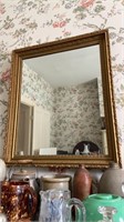 Large antique gold framed wall mirror , 30x35