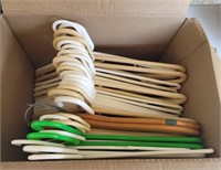 Box of wood and plastic hangings
