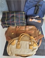 Travel bags and suitcases. Some are new.