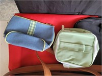 Assorted travel and storage bags.