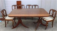 Carved mahogany dining table w/ leaf & 6 chairs