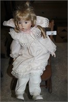 OLD WOOD ROCKING CHAIR WITH DOLL
