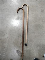 2 wooden walking canes