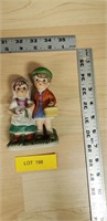 boy and girl ceramic figure