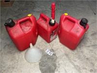 Two 2.5 gal, 1 gal fuel containers & funnel