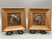 2 embossed copper dog bust plaques