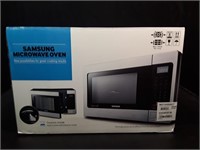 New Samsung 1.1 cu ft Microwave Oven. Model