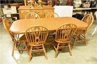 Lot #516 - Quality Furniture Oak dining table