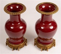 Pair of United Wilson Porcelain and Bronze Vases.