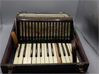 Vintage Wurlitzer accordion with box