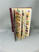 small stock book w/ world stamps