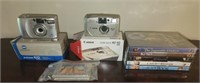 Estate lot of vintage cameras DVDs and more