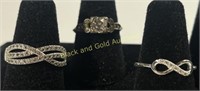 (2) Sterling Silver Rings & (1) Unmarked Ring