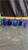 Vintage small blue bottles