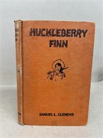 Huckleberry Finn by Samuel Clemons