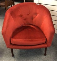 RED UPHOLSTERED BARREL STYLE MID CENTURY CHAIR