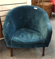 BLUE UPHOLSTERED BARREL STYLE MID CENTURY CHAIR