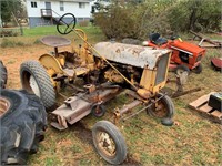 International CUB Tractor.  Belly mower