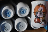 box of Norman Rockwell cups