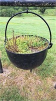 Hanging steel kettle, approximately  24 inches