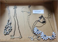 APPROX 6 DIFFENENT NECKLACES W/ PENDANTS