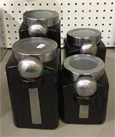 Four piece ceramic canisters - largest canister