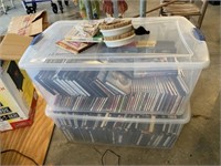 2- Totes of Assorted DVD's & Power Stations