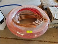 ROLL OF COPPER TUBING AND PEX TUBING