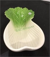 Ceramic celery dish measuring 2 1/2 inches tall,