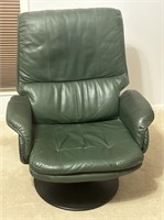 Leather arm chair has matching ottoman earlier in