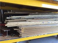 Stack of floor protection includes masonite,