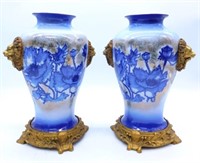 Gilt Lion's Heads Blue and White Vases.