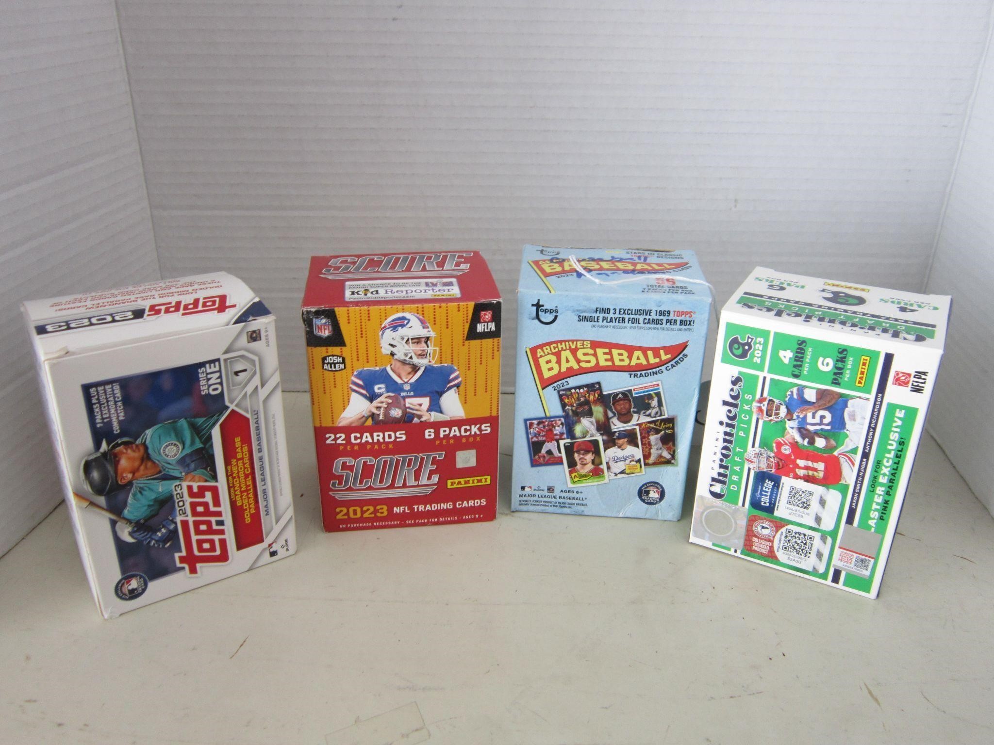 4 BOXES OF COLLECTIBLE SPORTCARDS